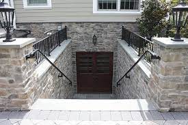 Open position steel sidewalk basement access double door with lockable slide bolt and welded frame. Walkout Basement Doors Walk Out Basement Copper Chimney Pots Kitchen Basement Entrance Walkout Basement Basement Doors