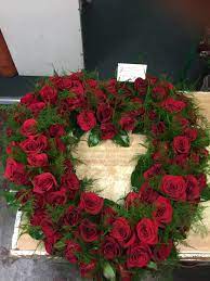 Our sympathy flowers and tributes can be ordered online where you can, at your leisure, peruse over 20 pages of dedicated funeral designs. Red Roses Heart For Sympathy In San Juan Capistrano Ca Mother Earth Florist Funeral Floral Funeral Flower Arrangements Casket Flowers