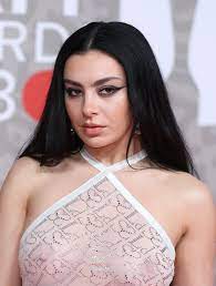 Charli XCX goes sheer and braless at the 2023 Brit Awards