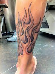 This arm sleeve tattoo depicts the japanese oni, or a japanese monster, along with a dragon. Flames Flame Tattoos Fire Tattoo Tribal Sleeve Tattoos
