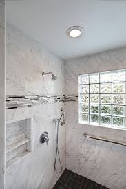 A garden bath tub and extravagant entirely marble lined walk in shower make this primary bath fit for a king or queen. White Marble Walk In Shower Modern Bathroom Detroit By Dreammaker Bath Kitchen Houzz