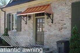 This Lovely Residential Copper Awning Accents The Entry Way And Adds So Much Character Door Awnings Awning Over Door Front Door Awning