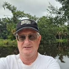 Why does my Orion SkyQuest XT6 telescope focus behind the eyepiece?