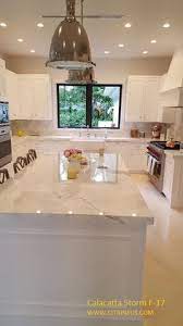 Steps away from the dining area is a newly updated kitchen outfitted with pristine marble countertops, dark brown cabinets, hardwood floors, and stainless steel appliances. Nancy Yingling Nancyyingling Profile Pinterest