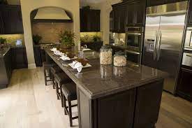Kitchen tile flooring can be tricky to install for even seasoned diyers as the process requires a special saw for cutting pieces to fit around cabinets or corners. 50 High End Dark Wood Kitchens Photos Designing Idea