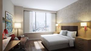 Each spacious two bedroom suite features either a queen or full in each bedroom along with a sofa sleeper in the separate living area, kitchenette area including electric stovetop, mini fridge or full refrigerator, microwave, coffee maker and cabinet space, dining area. Marriott Opens Dual Branded Springhill Towneplace Suites In New Orleans Hotel Management