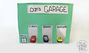 This cardboard toy car garage is a dream! Diy Upcycled Toy Car Repair Garage