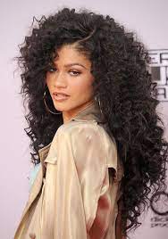 Mane Attraction 20 Times Zendaya Slayed The Red Carpet With Her Hairstyles Cute Curly Hairstyles Curly Hair Styles Curly Hair Styles Naturally