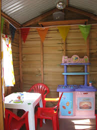 A Cubby House Interior With Kids Kitchen Bunting Table And Chairs Tea Set And Brightly Coloured Curtains Don T Forget The D Cubby Houses Cubbies Play House