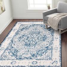I found the solution to the smell: Ophelia Co Khalil Blue Beige Area Rug Wayfair