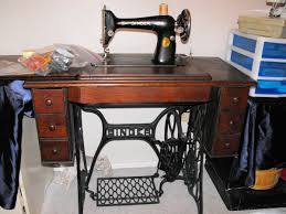 A lovely vintage singer sewing machine with storage cabinet and bench. 1924 7 Drawer Singer Sewing Machine Collectors Weekly