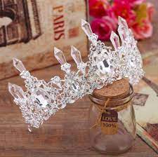 Thompson writes, the crown incarnates the intuition of royal ancestral force, the revelation of great moral insight in the person of the king, and the glitter of aesthetic experiences. royal duties Ice Queen Royal Crown Ice Queen Party Hair Accessories Tiaras Jewellery