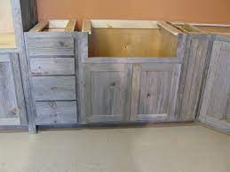 Kitchen cabinet curtain ideas that will instantly beautify your interior. Weathered Gray Barn Wood Kitchen Rustic Wood Furniture Reclaimed Wood Kitchen Rustic Wood Cabinets