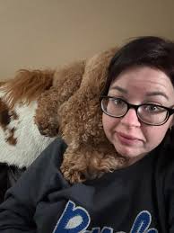 Is my Goldendoodle snuggling excessively due to illness or other reasons?