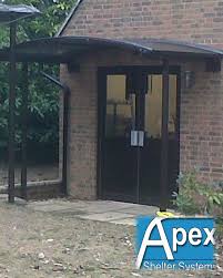 My design was to have the brackets match the existing roof brackets, the pitch and width match the house, and a wainscoting ceiling to match the porch ceiling. Braemar Entrance Door Canopy Apex Shelters