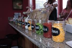 We did a taco bar at my sons graduation party last year & it was great!. Sides In Mason Jars Graduation Party Foods Party Food Buffet Taco Bar