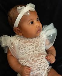 Esther Grace, Esther Grace you're beautiful. Esther Grace, Esther Grace  you're wonderful You're light from heaven. You light up our whole world  You're light from heaven. You light up our whole world