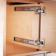 These slides also known as up and under slides allow the door to open with an upward motion and then at the top of the cabinet slide back into the unit. Ez Pivot Door Slides Sliding Cabinet Door Hardware Sliding Cabinet Doors Cabinet Door Hardware