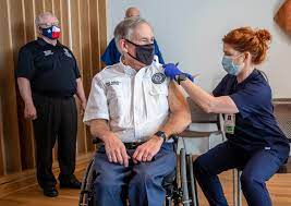 Abbott is fully vaccinated and so far is experiencing no symptoms. Greg Abbott Photo With Jimmie Vaughan Raises Covid 19 Concerns