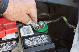 Greenish residue on the terminals indicates corrosion. How To Disconnect Your Vehicle S Battery
