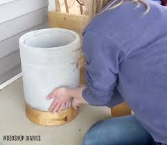 With a number of different designs and materials to browse through, your flowers will have never looked more appealing. Diy Concrete Planter Pot With Wooden Base Tutorial