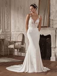 The Beauty Of Flowers Envelops This Romantic Mermaid Wedding Dress Mermaid Skirt In Crepe Embroide Navy Wedding Dress Wedding Dresses St Patrick Wedding Dress