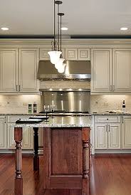 Off White Kitchen With Stained Island Kitchen Design Ideas Kitchen Renovation Kitchen Cabinets Kitchen Design