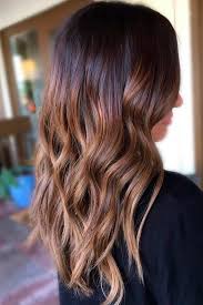Wonderful brown hair having longe highlights sports smooth and shining texture. 50 Trendy Choices For Brown Hair With Highlights Lovehairstyles
