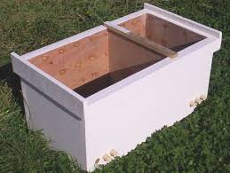 Bees getting ready to swarm on a top bar hive. Top Bars That Don T Touch Aka Using A Cover Cloth Beesource Beekeeping Forums
