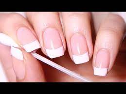 A woman getting a french manicure. Diy French Manicure Salon Nails At Home Youtube