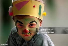 Blake Harmon shows off his face painting during the Perim Arts... News  Photo