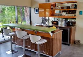 Replace curved, ornate kitchen cabinets with plain, flat wood ones. 75 Beautiful Mid Century Modern Home Bar With Laminate Countertops Pictures Ideas April 2021 Houzz