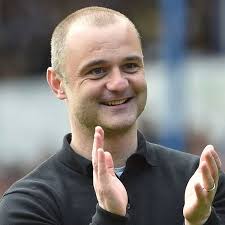 Birkenhead, UK. 11th Nov, 2020. Harry McHugh of Wigan Athletic (c)  celebrates with his teammates after scoring his teams 2nd goal. The Papa  John's Trophy, EFL Trophy, group D match, Tranmere Rovers,