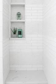 First, the size of your bathroom does matter. White Hexagon Shower Tiles In A Transitional Walk In Shower Featuring White Stacked Wall Tiles In Nich Bathroom Shower Tile Bathroom Interior Bathrooms Remodel