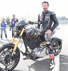 the matrix star posed proudly on one of his custom bikes from his arch motorcycle company archmoco カスタムバイク カフェレーサー バイク乗り