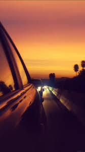At sunset, driving in las vegas, nevada. Cool Car Sunset Wallpaper