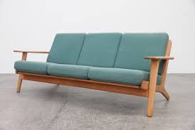 This two seats sofa has a simple, elegant look, the angled tilt of the seat and firm. Plank Sofa By Hans Wegner The Vintage Shop