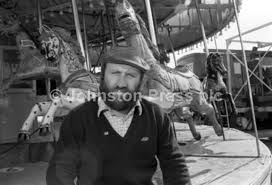 20378057-Regular at the Links Fair in Kirkcaldy, John Wilmot and his  carousel ride, one of the last of its kind in Scotland, April 1984.