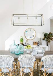We hope these modern coastal dining room designs will inspire you as you go about curating this important room in your home. Coastal Dining Room With Blue French Bistro Chairs Cottage Dining Room