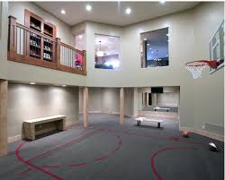 This style is equipped with a living room and a ball cart for entertaining ease. Interior Design The Wonderful Design Of The Basketball Court In House With The Interesting Style The Elegant Design Of The Basketball Court In House With The Gray Floor Also The White Wall