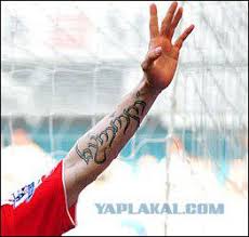 Fernando torres has his name written in elvish on his arm (image: Tattoo Players And Their Meaning Page 1