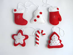 Green represents the continuance of life through the winter and the christian belief in eternal life through jesus. Felt Christmas Ornaments Felt Stocking Tree Mitten Star Candy Cane Bel Ornaments Red And White Christmas Ornamets Tree Decorations Quilt Craft Ideas