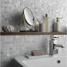 Why not select some matching wall shop mosaic tiles and create feature designs around your shower, bath, or basin splashback. White Mother Of Pearl Marble Mosaic Tile 305x305mm Sheet Luxury Tiles