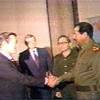 Defense secretary donald rumsfeld met with saddam hussein, traveling to iraq as a special envoy. 1