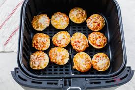 Arrange 9 frozen bagel bites about 1/2 inch apart on a baking sheet or shallow pan. How To Make Bagel Bites In The Air Fryer Air Fryer Eats