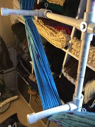 Duct tape the wine rack to the lazy susan while holding it taut against the yarn skein. Wind Em Up My Yarn Winding Diy Swift Stitch Hustle