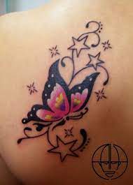 Butterfly Tattoo With Stars Tattooshunt Com Colorful Butterfly Tattoo Butterfly Tattoo Butterfly Tattoo Designs
