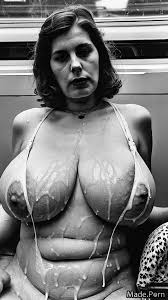 Porn image of vintage big tits huge boobs close up dildo wet train created  by AI