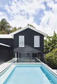 A Queensland Pool House With New York Loft Style Gray House Exterior White Exterior Houses Exterior Paint Colors For House