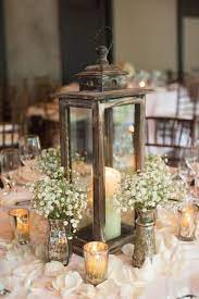 20 Rustic Wedding Centerpiece Ideas Wedding Floral Centerpieces Lantern Centerpiece Wedding Wedding Centerpieces